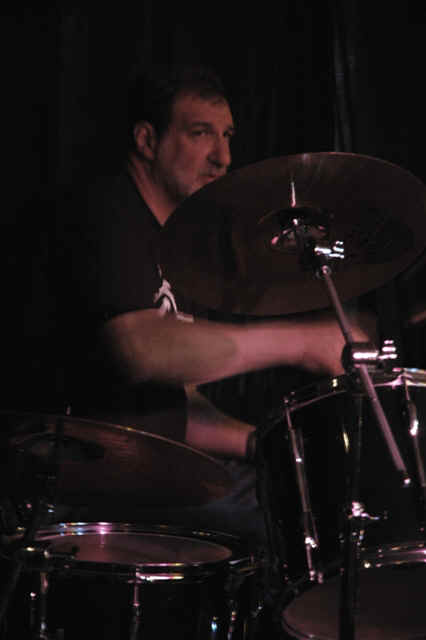Al looking up from drums